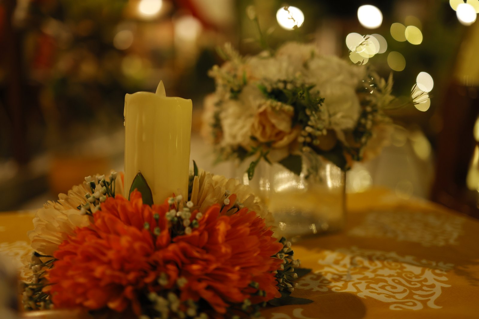 Candlelight and flowers — a table detail at TCP